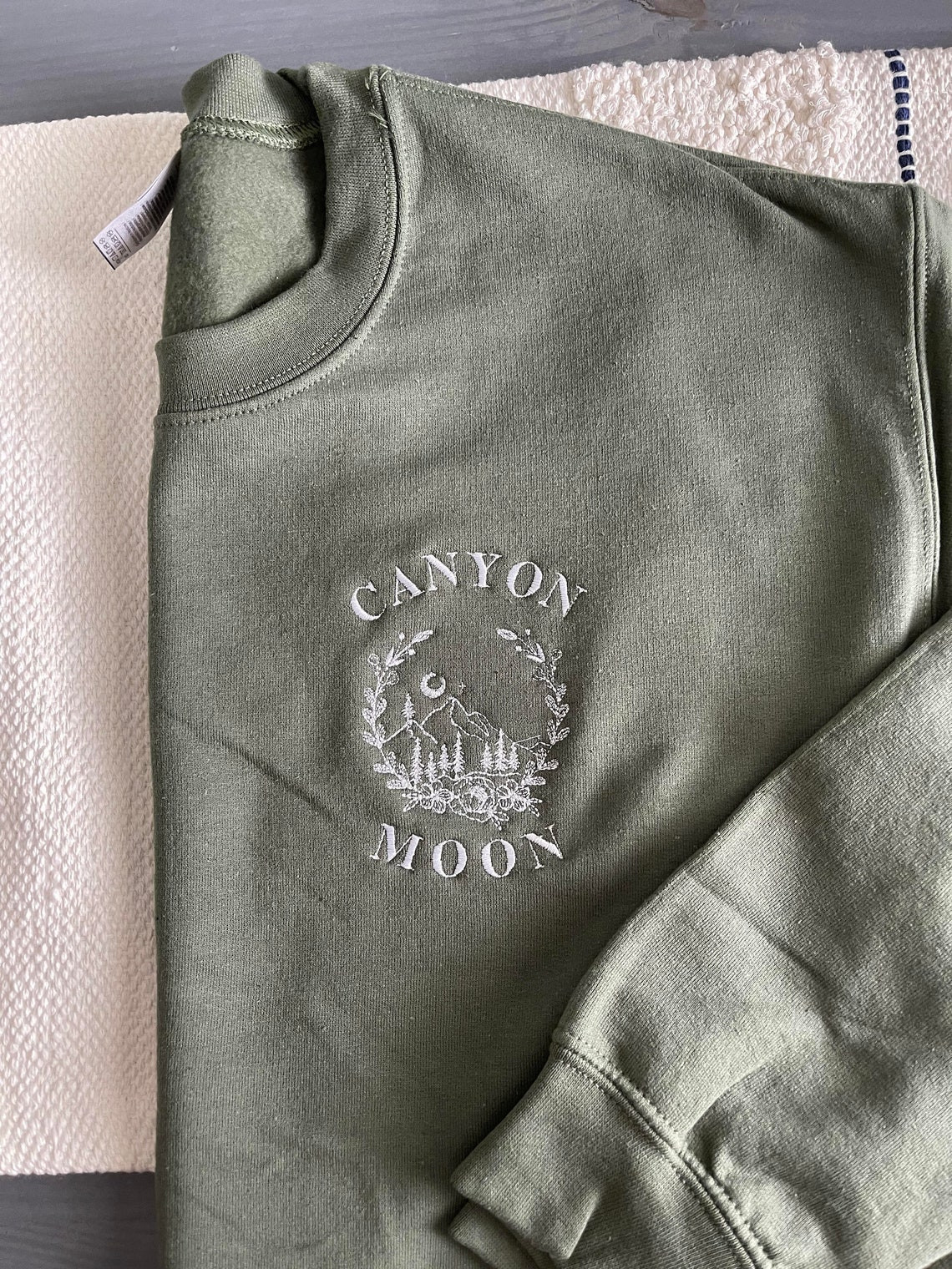 Left Side Embroidered Old Lovers Canyon Moon Crewneck Sweatshirt Embroidered